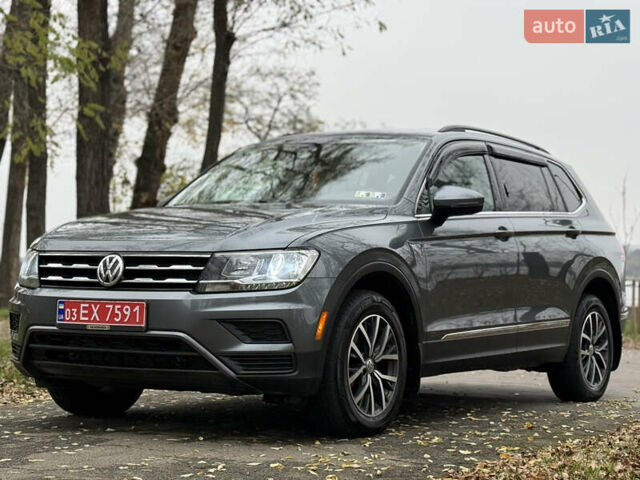 Сірий Фольксваген Тігуан, об'ємом двигуна 2 л та пробігом 212 тис. км за 16900 $, фото 1 на Automoto.ua