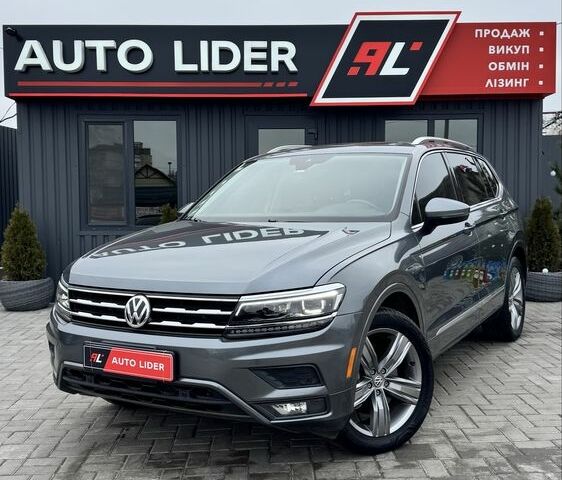 Серый Фольксваген Тигуан, объемом двигателя 2 л и пробегом 117 тыс. км за 19900 $, фото 1 на Automoto.ua