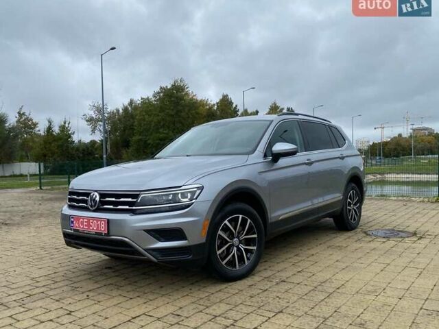 Серый Фольксваген Тигуан, объемом двигателя 2 л и пробегом 148 тыс. км за 19850 $, фото 1 на Automoto.ua