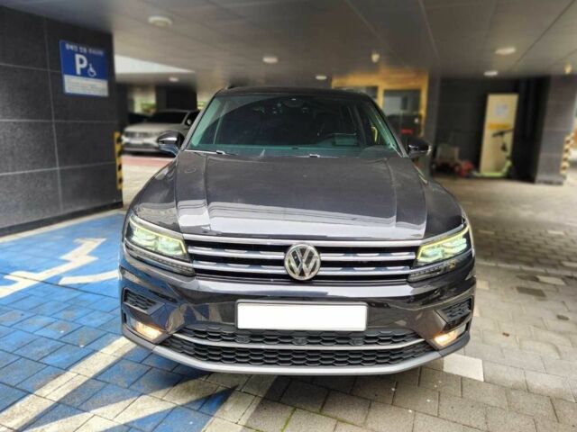 Сірий Фольксваген Тігуан, об'ємом двигуна 2 л та пробігом 69 тис. км за 13991 $, фото 1 на Automoto.ua