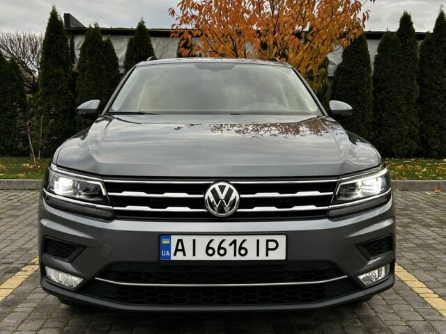 Серый Фольксваген Тигуан, объемом двигателя 2 л и пробегом 98 тыс. км за 22000 $, фото 1 на Automoto.ua