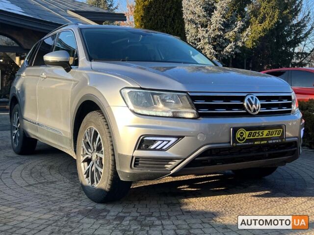 Сірий Фольксваген Тігуан, об'ємом двигуна 2 л та пробігом 56 тис. км за 19800 $, фото 1 на Automoto.ua