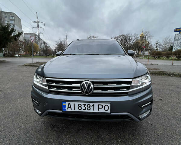 Сірий Фольксваген Тігуан, об'ємом двигуна 1.98 л та пробігом 128 тис. км за 18700 $, фото 1 на Automoto.ua