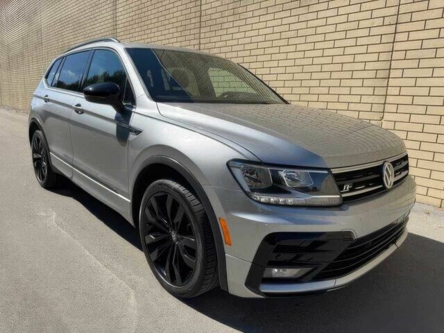 Серый Фольксваген Тигуан, объемом двигателя 2 л и пробегом 40 тыс. км за 10000 $, фото 1 на Automoto.ua