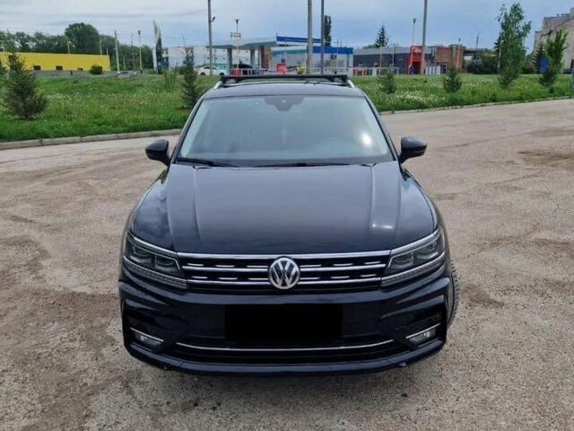 Серый Фольксваген Тигуан, объемом двигателя 2 л и пробегом 97 тыс. км за 11000 $, фото 1 на Automoto.ua