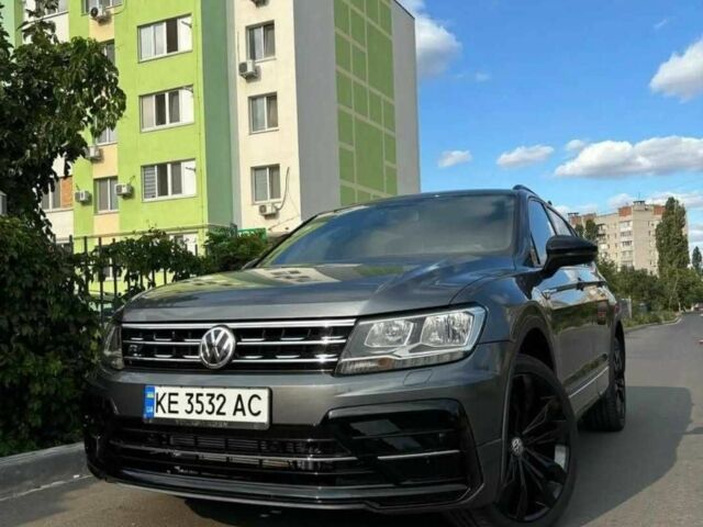 Серый Фольксваген Тигуан, объемом двигателя 2 л и пробегом 99 тыс. км за 23400 $, фото 1 на Automoto.ua