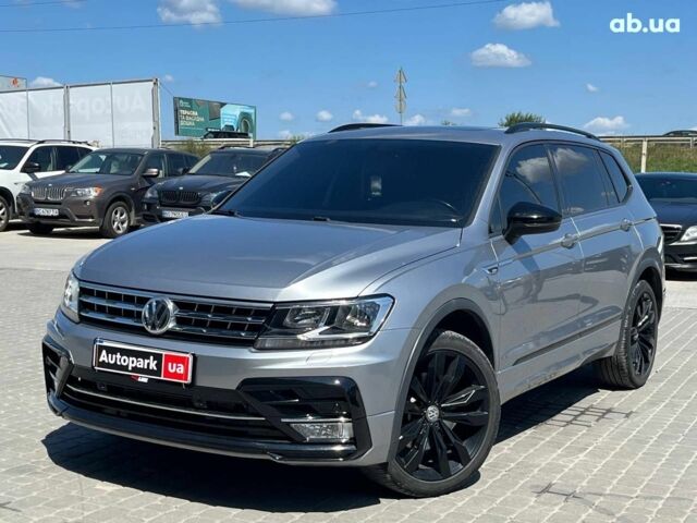 Серый Фольксваген Тигуан, объемом двигателя 2 л и пробегом 135 тыс. км за 23690 $, фото 1 на Automoto.ua