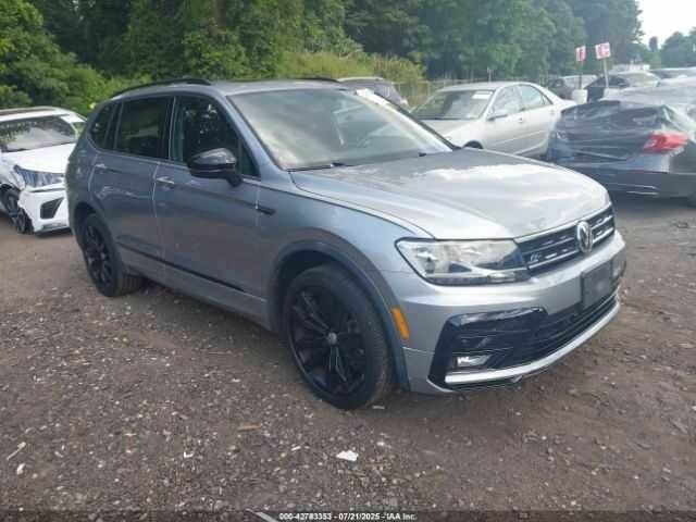 Сірий Фольксваген Тігуан, об'ємом двигуна 2 л та пробігом 32 тис. км за 4500 $, фото 1 на Automoto.ua