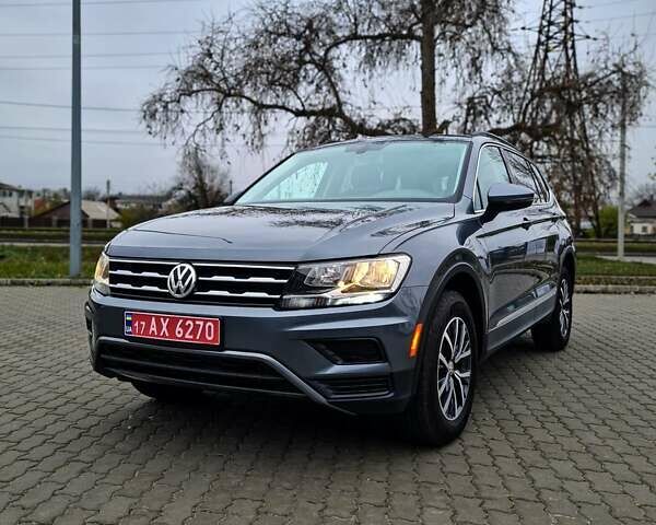 Серый Фольксваген Тигуан, объемом двигателя 2 л и пробегом 122 тыс. км за 20500 $, фото 1 на Automoto.ua
