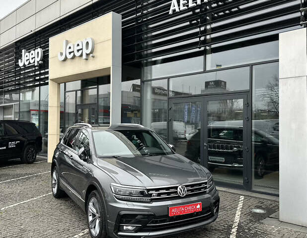 Серый Фольксваген Тигуан, объемом двигателя 1.97 л и пробегом 153 тыс. км за 27990 $, фото 1 на Automoto.ua