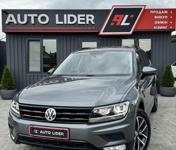 Сірий Фольксваген Тігуан, об'ємом двигуна 2 л та пробігом 97 тис. км за 19900 $, фото 1 на Automoto.ua