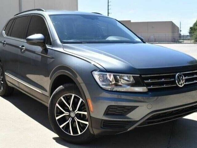 Серый Фольксваген Тигуан, объемом двигателя 2 л и пробегом 45 тыс. км за 9000 $, фото 1 на Automoto.ua