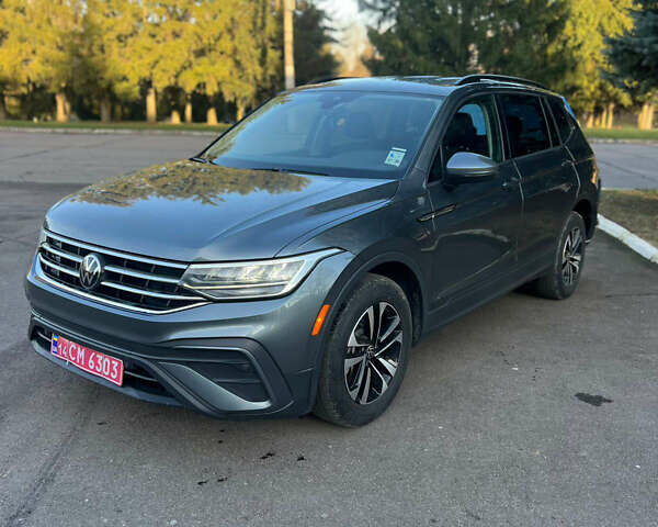 Сірий Фольксваген Тігуан, об'ємом двигуна 2 л та пробігом 77 тис. км за 19899 $, фото 1 на Automoto.ua