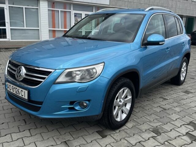 Синий Фольксваген Тигуан, объемом двигателя 2 л и пробегом 245 тыс. км за 9200 $, фото 1 на Automoto.ua