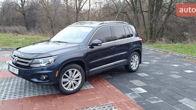 Синий Фольксваген Тигуан, объемом двигателя 2 л и пробегом 160 тыс. км за 10000 $, фото 1 на Automoto.ua