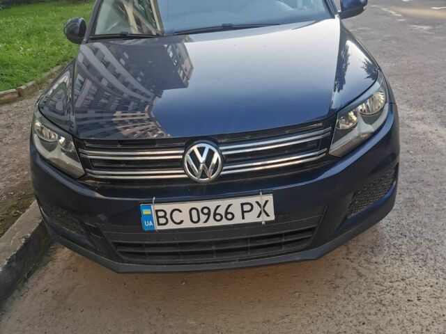 Синий Фольксваген Тигуан, объемом двигателя 2 л и пробегом 153 тыс. км за 9500 $, фото 1 на Automoto.ua