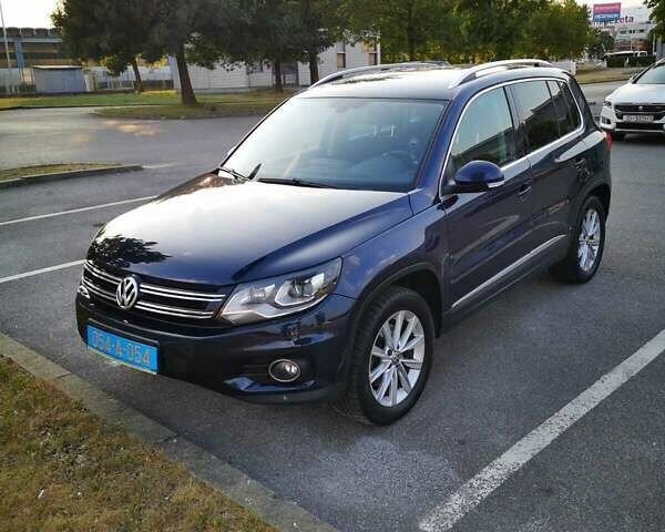 Синий Фольксваген Тигуан, объемом двигателя 1.39 л и пробегом 179 тыс. км за 11500 $, фото 1 на Automoto.ua