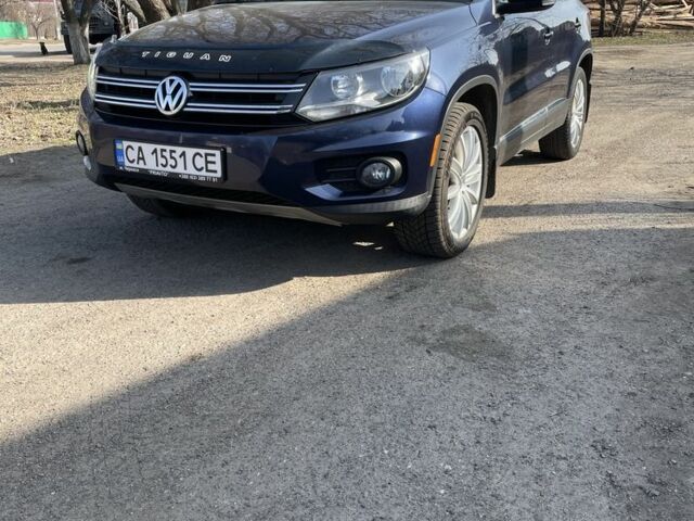 Синий Фольксваген Тигуан, объемом двигателя 2 л и пробегом 203 тыс. км за 13700 $, фото 1 на Automoto.ua