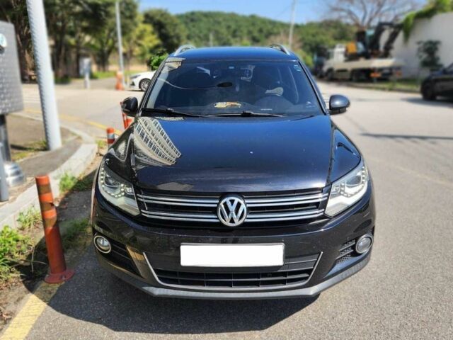 Синій Фольксваген Тігуан, об'ємом двигуна 2 л та пробігом 76 тис. км за 6955 $, фото 1 на Automoto.ua