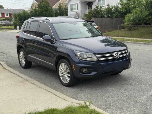 Синий Фольксваген Тигуан, объемом двигателя 2 л и пробегом 73 тыс. км за 9600 $, фото 1 на Automoto.ua