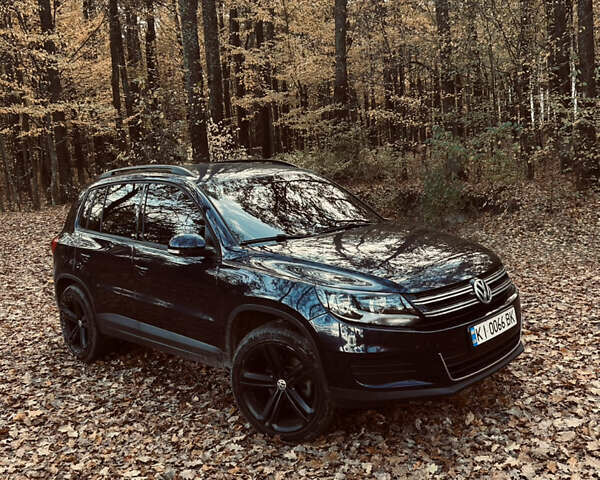 Синий Фольксваген Тигуан, объемом двигателя 1.98 л и пробегом 169 тыс. км за 12489 $, фото 1 на Automoto.ua