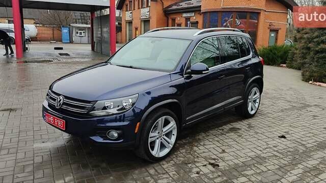 Синий Фольксваген Тигуан, объемом двигателя 2 л и пробегом 129 тыс. км за 12700 $, фото 1 на Automoto.ua