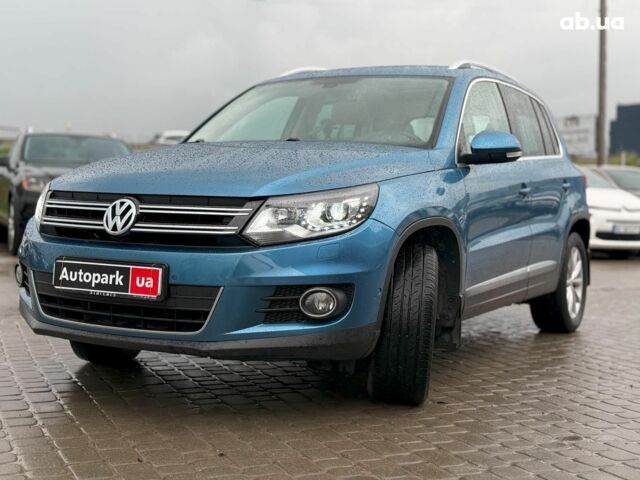 Синий Фольксваген Тигуан, объемом двигателя 2 л и пробегом 76 тыс. км за 18590 $, фото 1 на Automoto.ua