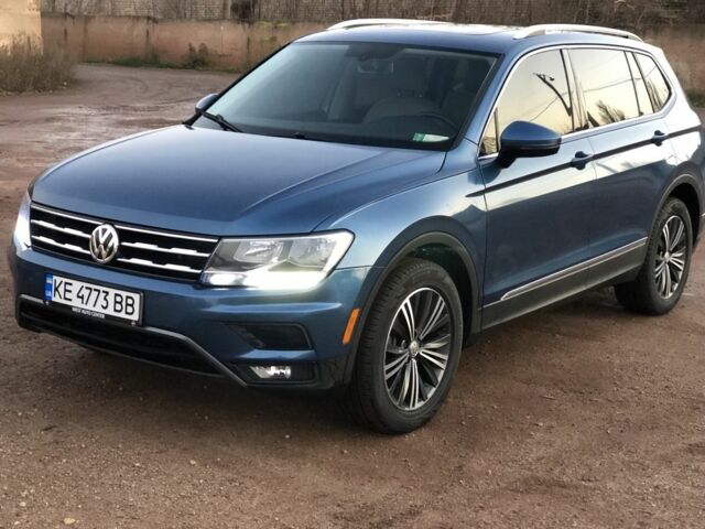Синий Фольксваген Тигуан, объемом двигателя 2 л и пробегом 169 тыс. км за 19500 $, фото 1 на Automoto.ua