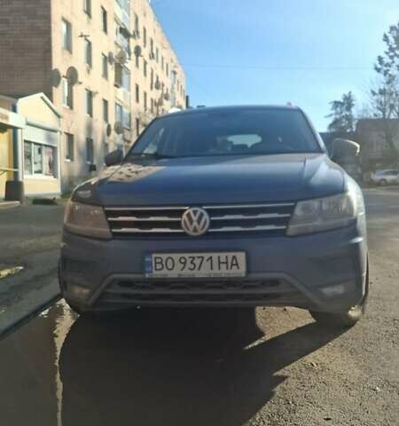 Синий Фольксваген Тигуан, объемом двигателя 2 л и пробегом 144 тыс. км за 19500 $, фото 1 на Automoto.ua
