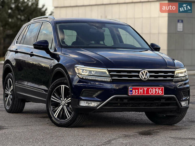 Синий Фольксваген Тигуан, объемом двигателя 2 л и пробегом 253 тыс. км за 22500 $, фото 1 на Automoto.ua