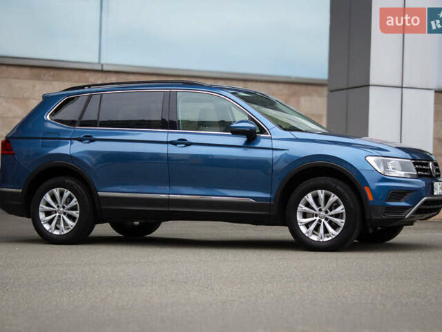 Синий Фольксваген Тигуан, объемом двигателя 2 л и пробегом 140 тыс. км за 18000 $, фото 1 на Automoto.ua