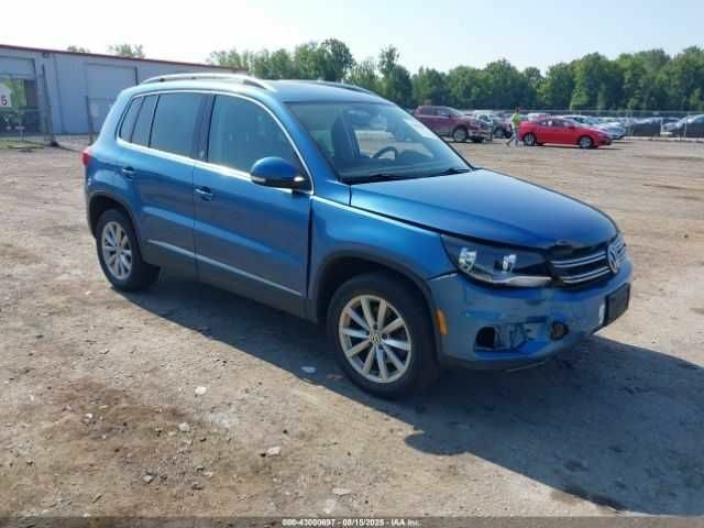 Синий Фольксваген Тигуан, объемом двигателя 2 л и пробегом 63 тыс. км за 1800 $, фото 1 на Automoto.ua
