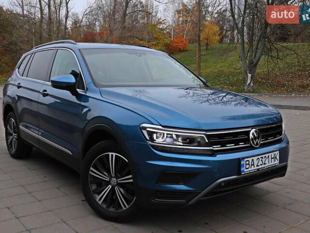 Синий Фольксваген Тигуан, объемом двигателя 2 л и пробегом 149 тыс. км за 18555 $, фото 1 на Automoto.ua