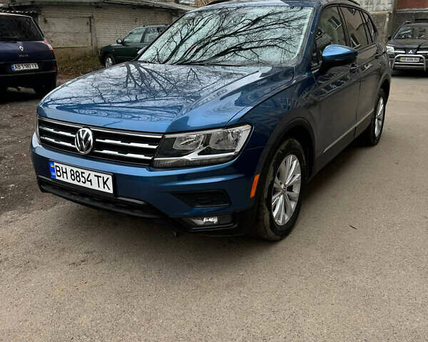 Синий Фольксваген Тигуан, объемом двигателя 2 л и пробегом 84 тыс. км за 17300 $, фото 1 на Automoto.ua