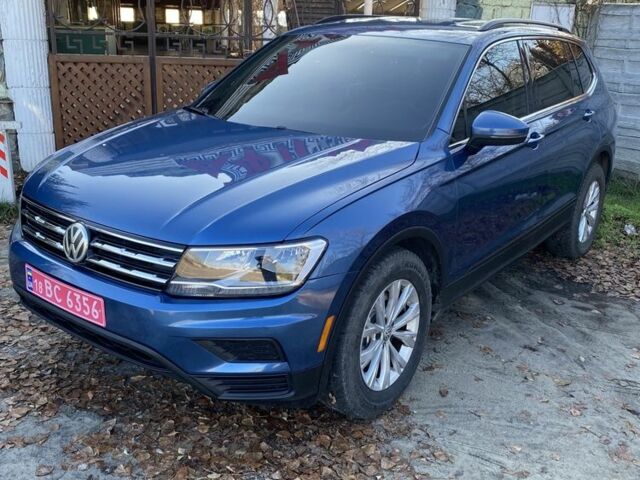 Синий Фольксваген Тигуан, объемом двигателя 2 л и пробегом 160 тыс. км за 15900 $, фото 1 на Automoto.ua