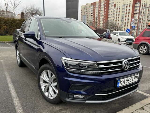 Синий Фольксваген Тигуан, объемом двигателя 2 л и пробегом 101 тыс. км за 25500 $, фото 1 на Automoto.ua