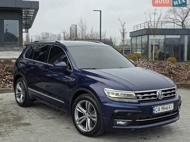 Синий Фольксваген Тигуан, объемом двигателя 2 л и пробегом 156 тыс. км за 26800 $, фото 1 на Automoto.ua