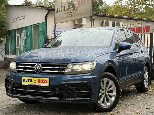 Синій Фольксваген Тігуан, об'ємом двигуна 2 л та пробігом 103 тис. км за 18999 $, фото 1 на Automoto.ua