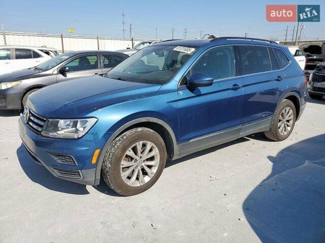 Синий Фольксваген Тигуан, объемом двигателя 2 л и пробегом 152 тыс. км за 4500 $, фото 1 на Automoto.ua