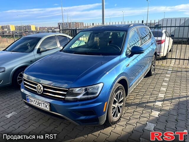 Синий Фольксваген Тигуан, объемом двигателя 2 л и пробегом 150 тыс. км за 25000 $, фото 1 на Automoto.ua