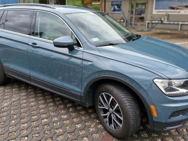 Синій Фольксваген Тігуан, об'ємом двигуна 2 л та пробігом 126 тис. км за 11200 $, фото 1 на Automoto.ua