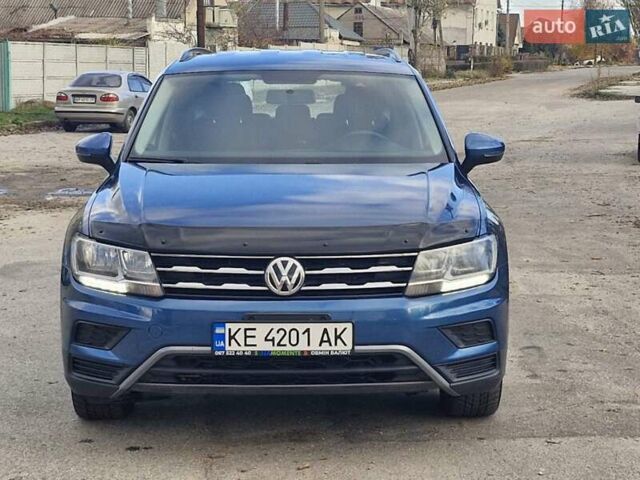 Синий Фольксваген Тигуан, объемом двигателя 2 л и пробегом 174 тыс. км за 16500 $, фото 1 на Automoto.ua