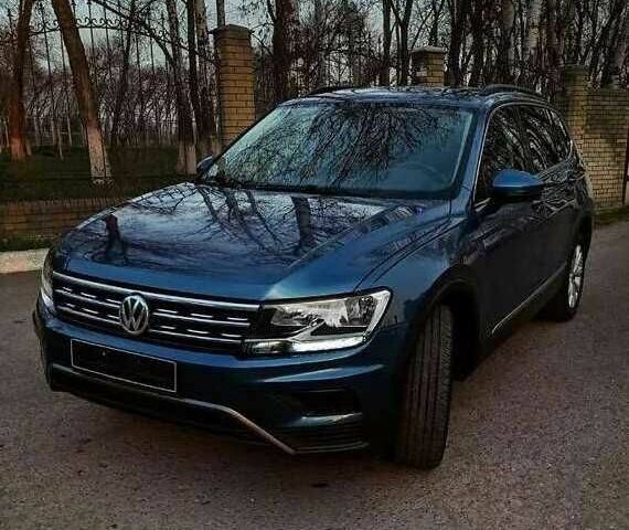 Синій Фольксваген Тігуан, об'ємом двигуна 2 л та пробігом 109 тис. км за 14500 $, фото 1 на Automoto.ua