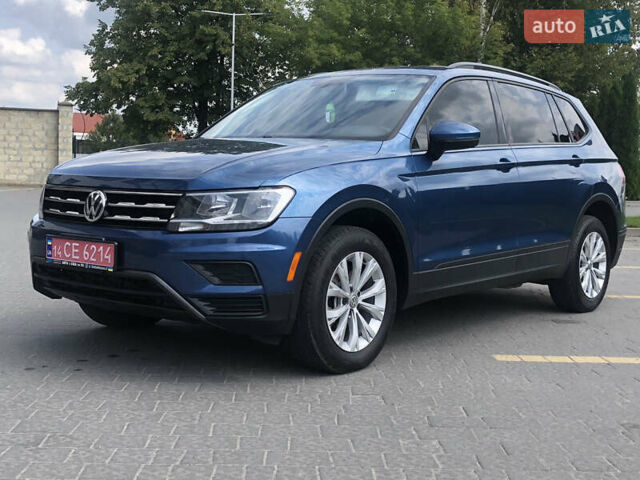 Синий Фольксваген Тигуан, объемом двигателя 2 л и пробегом 185 тыс. км за 16800 $, фото 1 на Automoto.ua