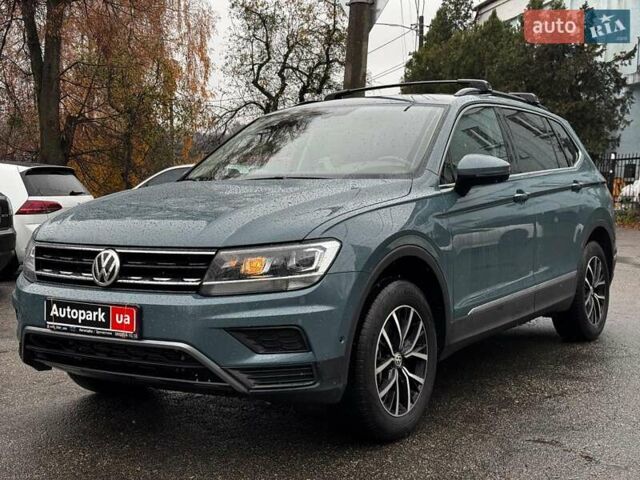 Синий Фольксваген Тигуан, объемом двигателя 2 л и пробегом 74 тыс. км за 21990 $, фото 1 на Automoto.ua