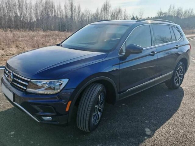 Синий Фольксваген Тигуан, объемом двигателя 2 л и пробегом 121 тыс. км за 12400 $, фото 1 на Automoto.ua