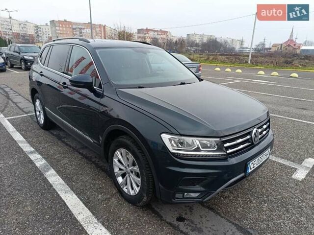 Зеленый Фольксваген Тигуан, объемом двигателя 2 л и пробегом 96 тыс. км за 19300 $, фото 1 на Automoto.ua