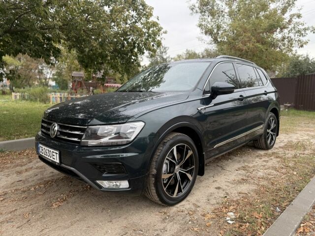 Зелений Фольксваген Тігуан, об'ємом двигуна 2 л та пробігом 106 тис. км за 19900 $, фото 1 на Automoto.ua