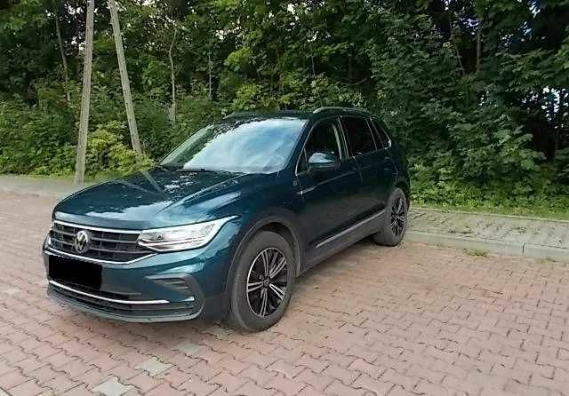 Зеленый Фольксваген Тигуан, объемом двигателя 2 л и пробегом 54 тыс. км за 11200 $, фото 1 на Automoto.ua