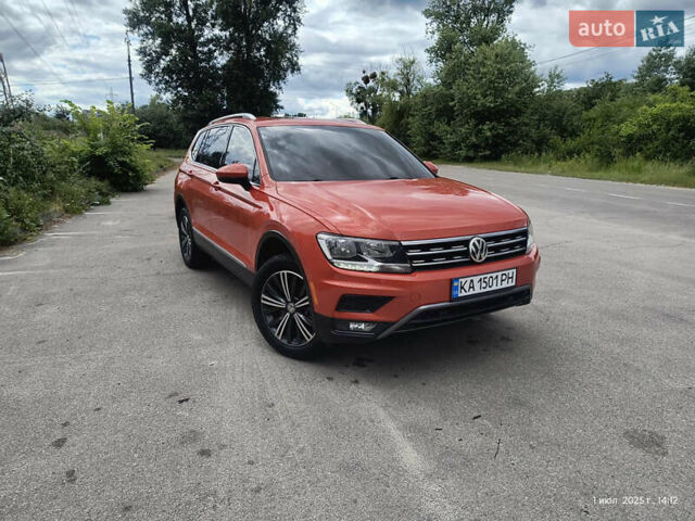 Помаранчевий Фольксваген Тігуан, об'ємом двигуна 1.98 л та пробігом 105 тис. км за 23000 $, фото 1 на Automoto.ua